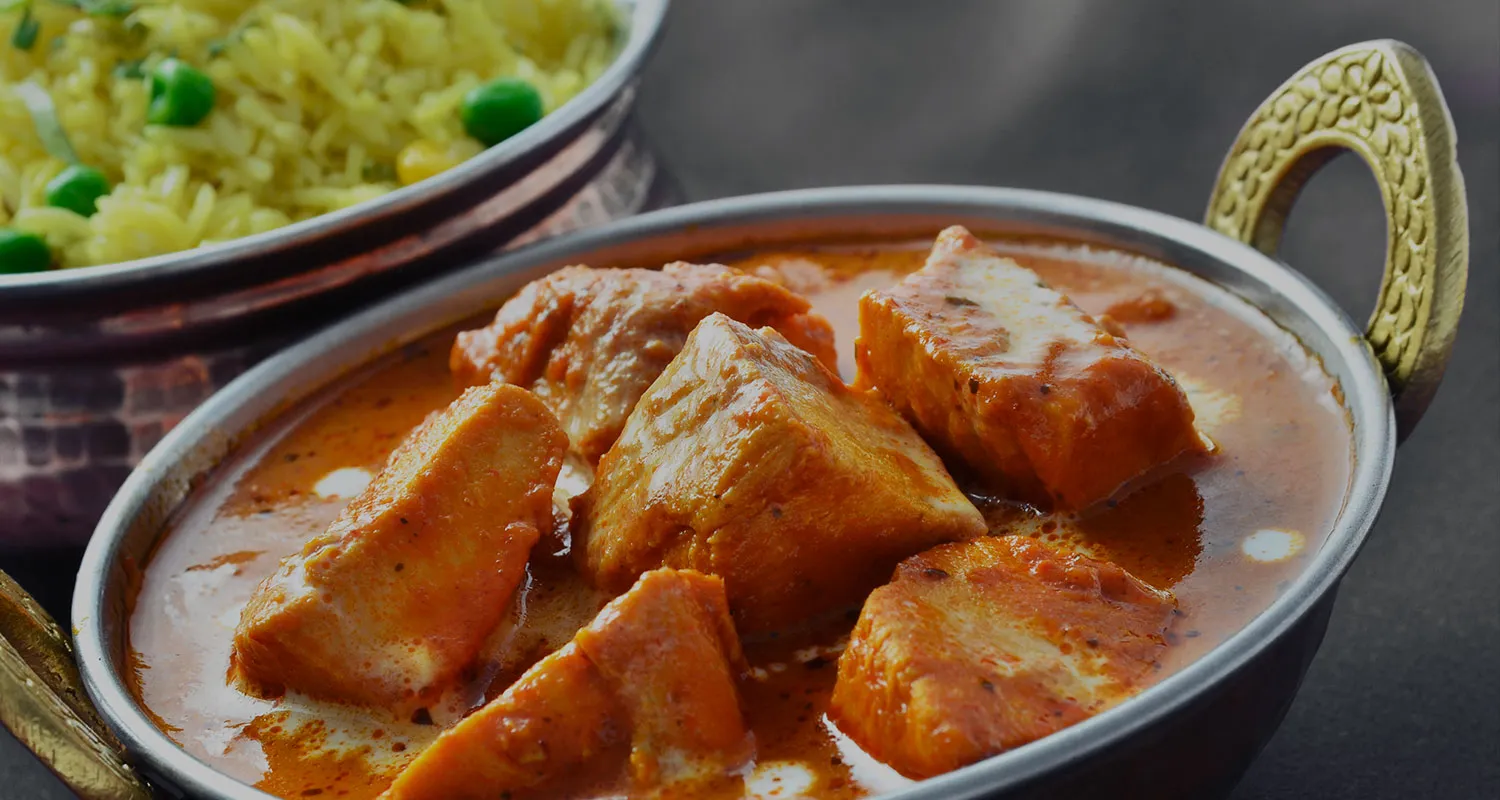 Butter Chicken with naan – Clay Oven's signature East Indian curry in Winnipeg